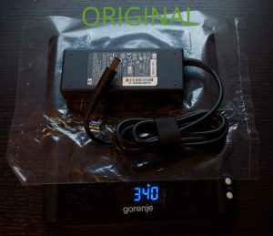 Original HP 90W power adapter weight is 340 g or 0.749 lb